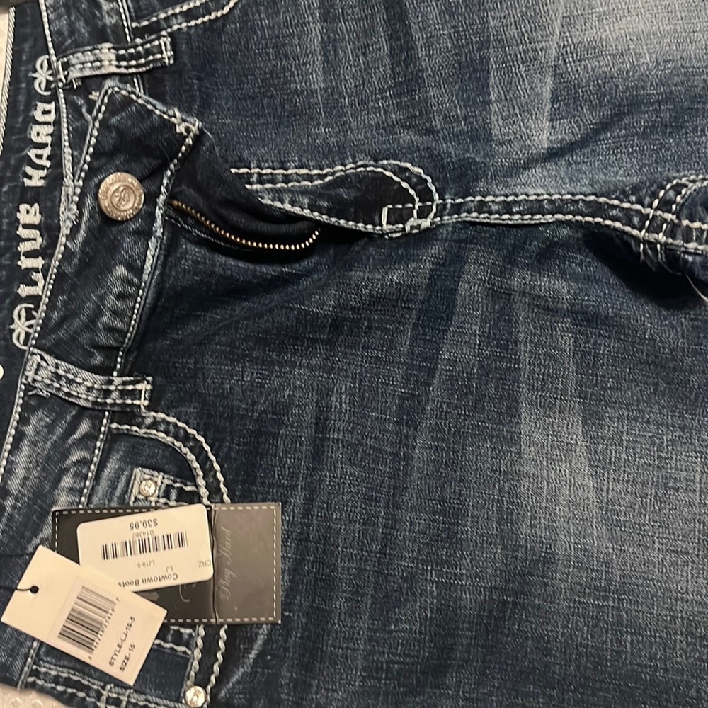 Brand new cowgirl jeans.